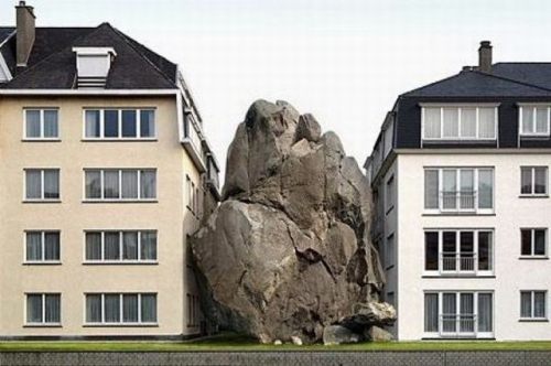 Rock in Between Buildings